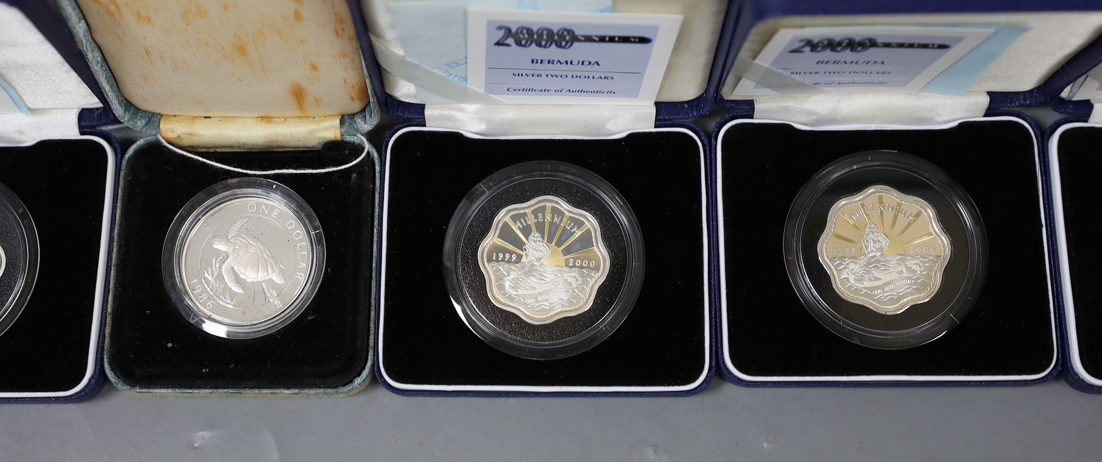 A group of boxed Bermuda silver coins